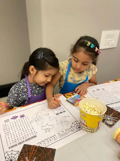 The fun doesn't stop at baking. I always bring along themed activities like these Halloween word searches to keep the kids engaged.