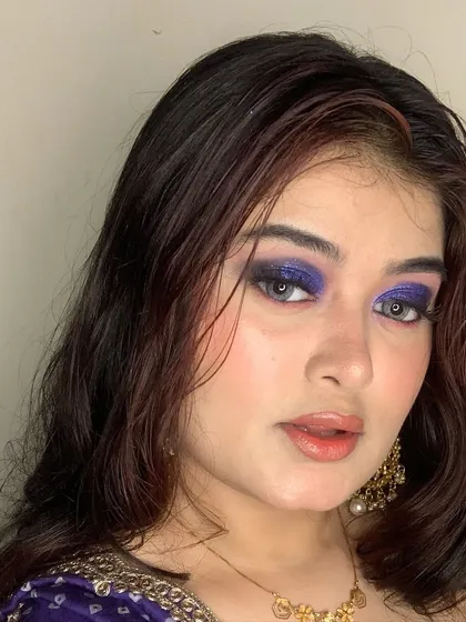 A close-up of a dramatic purple smokey eye. This is a great example of a bold, colorful look for a night out.