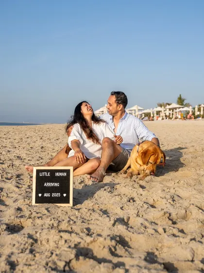 An unforgettable beach maternity shoot in Dubai, announcing a new "little human" on the way. Astro, the handsome Labrador, was the perfect companion for this special milestone. Outdoor lifestyle sessions like this are perfect for capturing your family's next chapter.