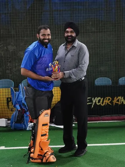 One of our goalkeepers receiving an award at the Sunday Sultans Hockey Carnival. We celebrate individual achievements as a victory for the entire team.