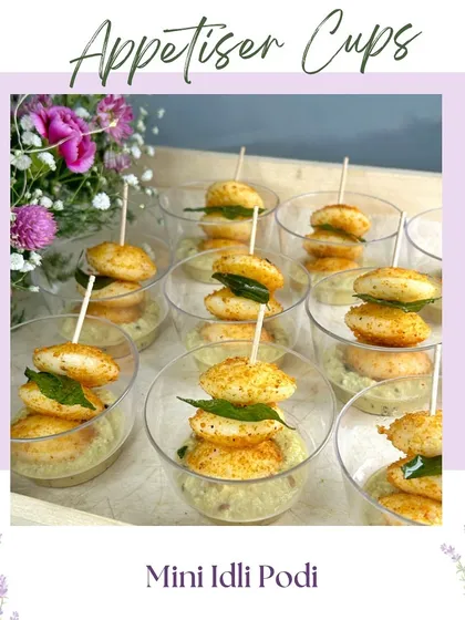Our Mini Idli Podi appetizer cups. This dish offers a modern twist on a South Indian classic, perfect for adding a unique flavor to your event.