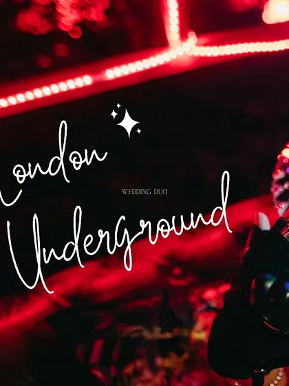 Welcome to the London Underground. This cocktail night was inspired by the electric energy of London's nightlife, featuring bold red neon and dazzling mirror and light performers.