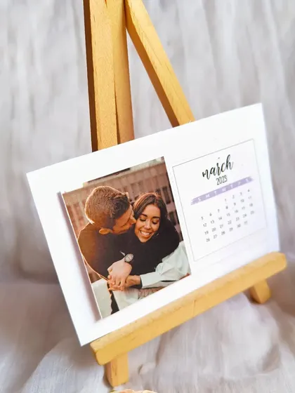This March calendar card features a sweet, candid photo of a couple. It's all about celebrating your personal moments.