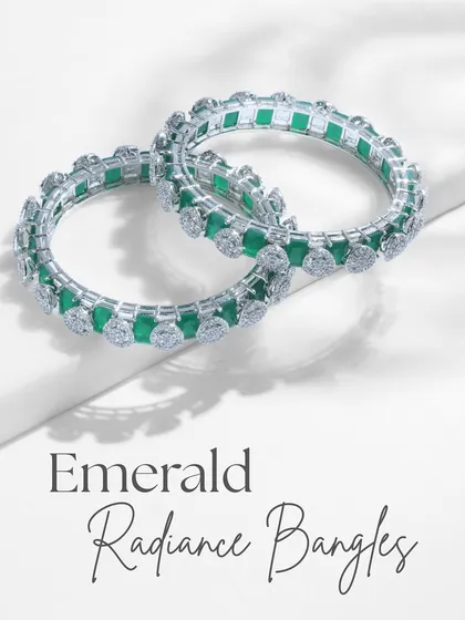 The Emerald Radiance Bangles, designed for those who want to make a bold statement. These feature octagon-cut emeralds and diamond clusters for a look of regal elegance.