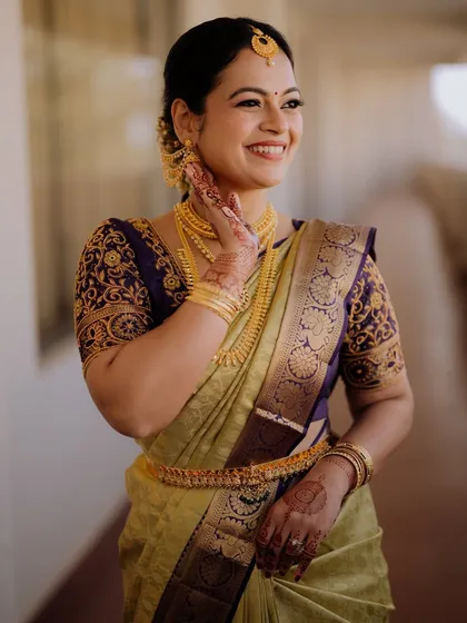 A beautiful portrait of this bride, her makeup blending heritage with modern grace for a timeless look.
