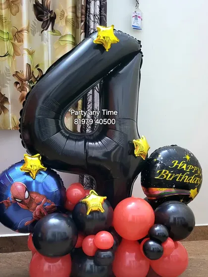 A 4th birthday bouquet with a Spider-Man theme.