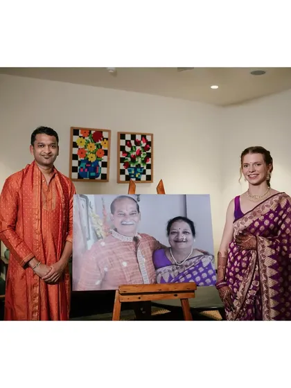 A very special moment. For the Mehendi, the bride chose to wear her late mother-in-law's traditional purple brocade saree. We recreated this portrait of Viraj's parents to honor her memory.