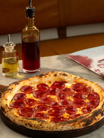 Just look at that perfectly cooked pepperoni pizza, fresh from the wood-fired oven. This is the kind of delicious, high-quality result you can expect to achieve in my workshop.