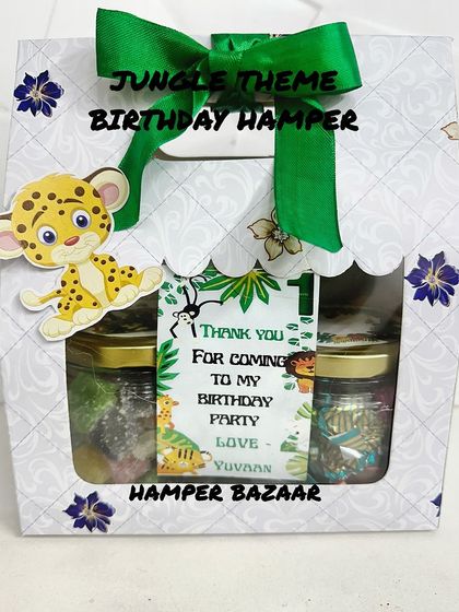 A budget-friendly jungle theme hamper in a cardboard gift bag, perfect for kids' party return gifts.