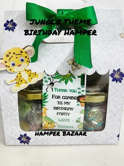 A budget-friendly jungle theme hamper in a cardboard gift bag, perfect for kids' party return gifts.