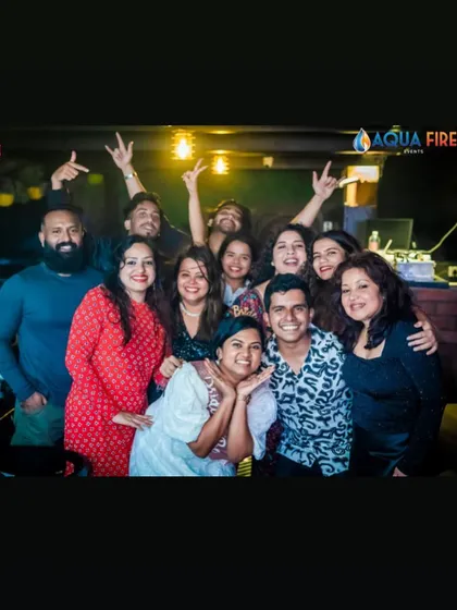 A big group photo with friends and regulars. My parties are all about community and good times.