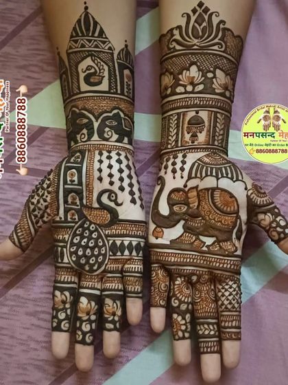 A unique design featuring a large, decorated elephant on one palm and a peacock on the other. The arms are topped with architectural domes, adding to the traditional feel.