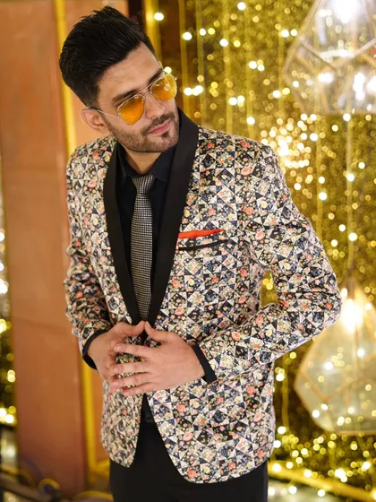 To shine like gold, you have to endure the grind. This look, against a backdrop of golden lights, reflects that journey.