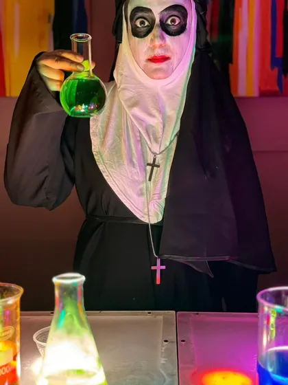 Our hands-on workshops are a huge hit. Here, our expert from Science-O-Mania leads a 'Mad Scientist' session, letting kids mix their own glowing, bubbling potions in a safe and super fun environment.