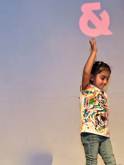 Here is Anaira Kapoor, shining on stage with grace and confidence. We focus on building strong stage presence from a young age.