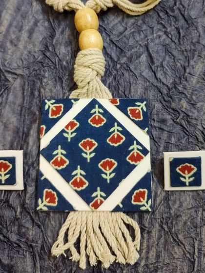 These images showcase the wide variety of my fabric jewelry collection, including different prints, paintings, and color combinations, all available for wholesale.