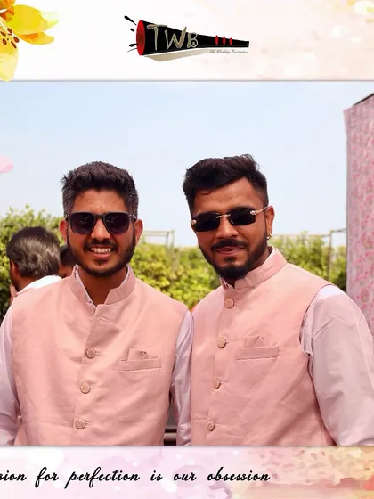 Two of our team members in matching attire for a Mehendi celebration, showcasing our attention to detail in coordinating with the event's theme.