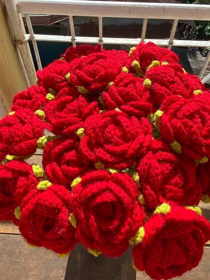 A top-down view of a classic red rose bouquet.