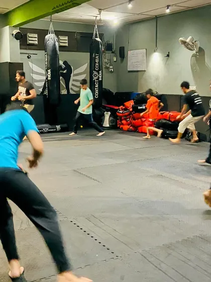 This action shot captures the dynamic movement of our training. Students are constantly in motion, learning to be agile and responsive.