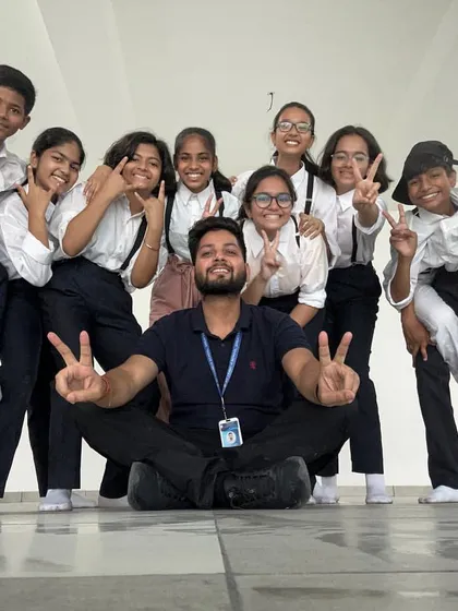 A fun, candid moment with my dance crew after a tough rehearsal. We are more than just a class, we are a family that supports and grows together.