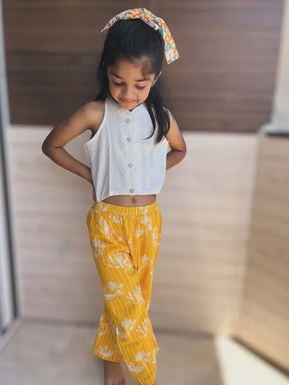Another look at our sunny yellow floral set. The soft cotton and happy print make it a perfect choice for bringing a little brightness to any day.