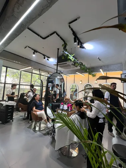 Team spirit is everything. Here you can see our stylists working together, ensuring every client gets the best possible service.