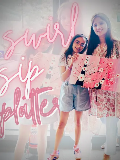 Swirl, sip, and splatter. A mother-daughter pair with their beautiful textured cherry blossom paintings, a perfect memory of their creative day out.