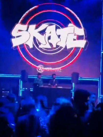 A different angle of my custom visuals on the screen, creating a branded and professional look for my set.