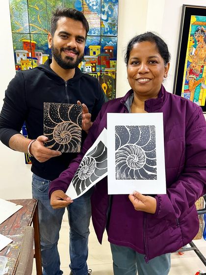 The fascinating spiral of a nautilus shell captured in a linocut print. A great example of how this technique can be used for detailed patterns.
