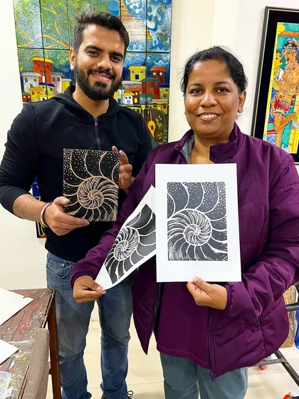 The fascinating spiral of a nautilus shell captured in a linocut print. A great example of how this technique can be used for detailed patterns.