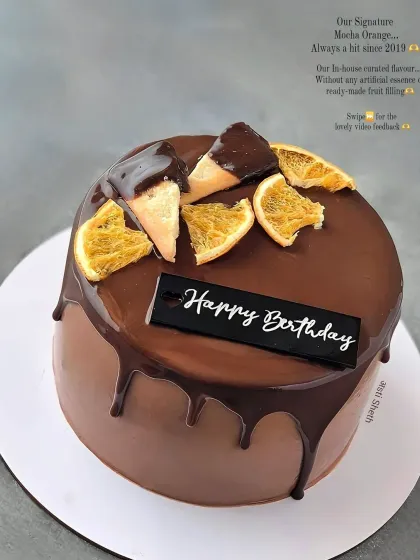 My signature Mocha Orange design, a hit since 2019. This cake is covered in a rich chocolate drip and topped with dehydrated orange slices.