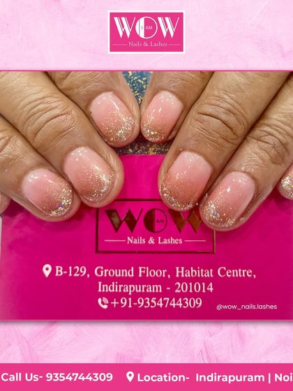 A soft and pretty look featuring a sheer pink base with a delicate silver glitter ombré at the tips. This is a perfect choice for a subtle touch of sparkle.