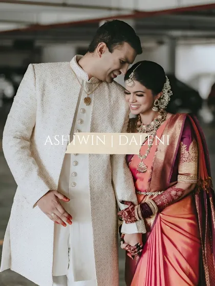 The joy of a South Indian wedding is radiant and infectious. Here, the groom in his classic sherwani and the bride in her vibrant Kanjeevaram saree share a laugh. This photo captures the blend of rich tradition and modern love that makes each wedding unique.