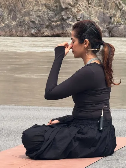 Practicing pranayama by the river in Leh. The sound of the water and the stillness of the mountains create a perfect environment for breathwork.