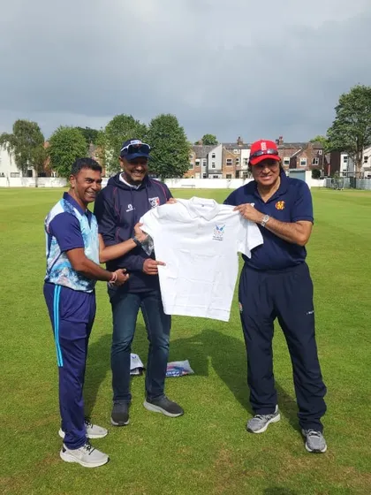 Exchanging team jerseys with the coaching staff at Urmstone. These moments of camaraderie and mutual respect are what make cricket a gentleman's game.