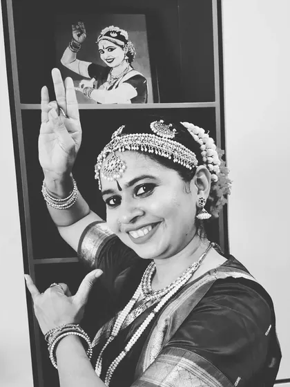 This is me in my element, dressed for a classical Bharatnatyam performance. The posture, the costume, and the expression all come together to honor this timeless art form. It represents the deep respect for tradition that I carry in all my dance forms.