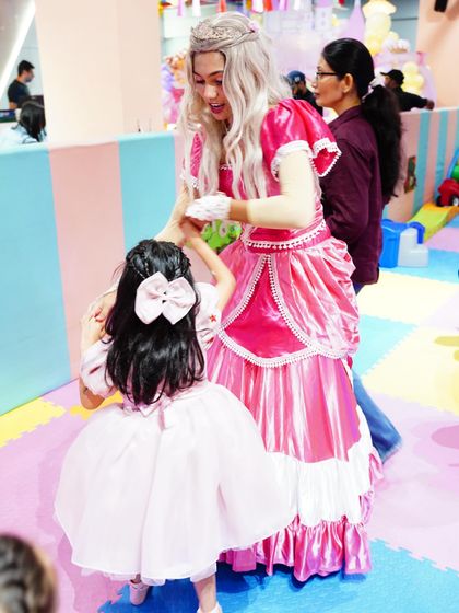 A sweet moment as the birthday girl dances with the princess. We create opportunities for one-on-one interaction that make the experience truly magical.