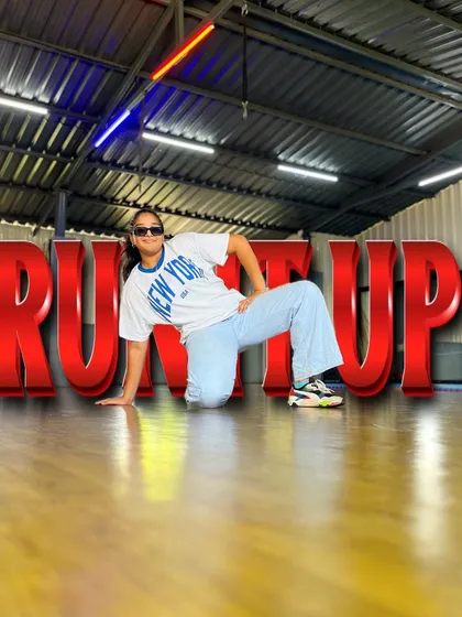 Capturing the attitude of our "Run It Up" street dance routine. This floor-work pose shows the blend of strength and style that makes our choreography stand out.