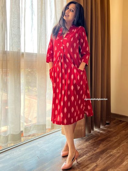 This versatile piece can be worn as a dress or a kurta. Made from pure handloom Ikat in a striking red, it features a comfortable fit and handy pockets.