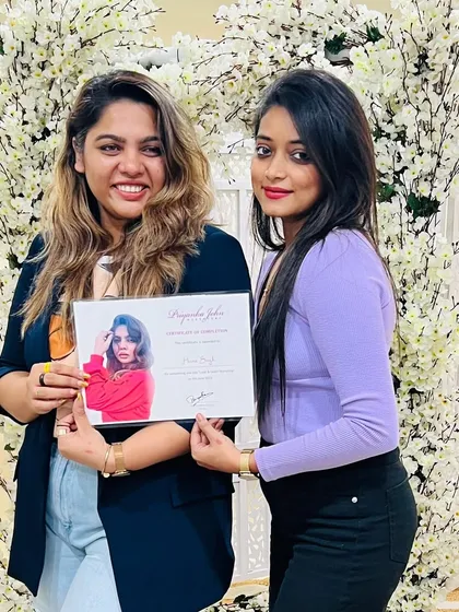 Another proud moment, receiving a certificate from one of my mentors. Continuous education is key to perfecting my craft.