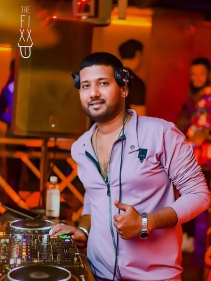 A thumbs-up from the DJ booth. Making people happy with music is the best part of my job.