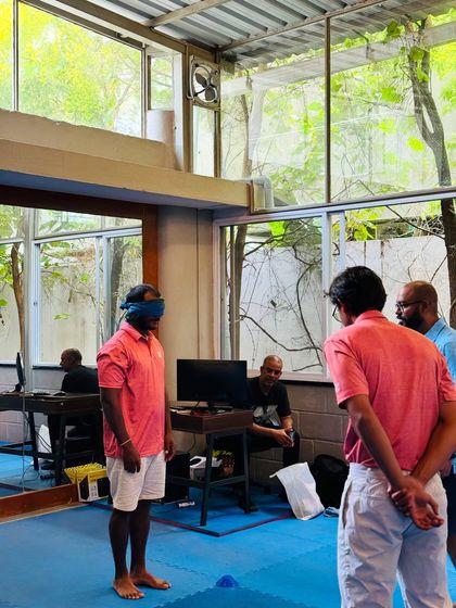 A wellness session on non-verbal communication. Through quizzes and interactive games like the 'Landmine' activity, our athletes learn the importance of clear communication and how much we say without speaking a word.