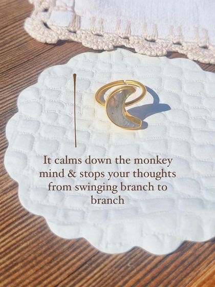 A close-up of the Labradorite Luna Ring, showing the beautiful flash of the stone. I make these to help calm the monkey mind and relieve stress.