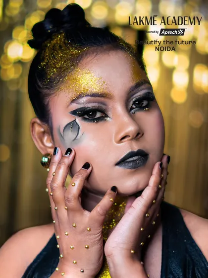 A close-up of a fantasy glam look with a hand-painted leaf detail. This shows the fine artistry and attention to detail that our advanced makeup courses cover.
