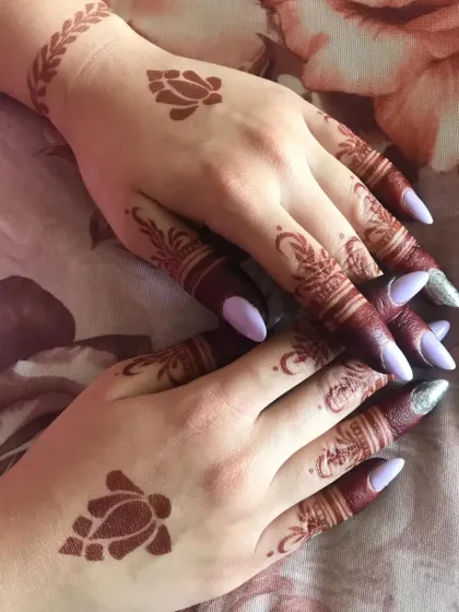 A minimalist design featuring turtle motifs. This is a great example of how we can incorporate unique and personal symbols into your mehndi.