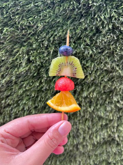 Another look at our colorful and healthy fruit skewers, perfect for a sunny day treat or as a light addition to any event.