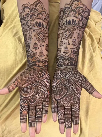 Another shot of the same traditional jhumka mehendi design, highlighting its symmetry and detail.