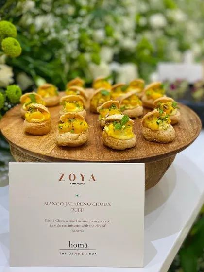 A closer look at the Mango Jalapeno Choux Puffs, a perfect fusion of sweet and spicy flavors in a delicate pastry.