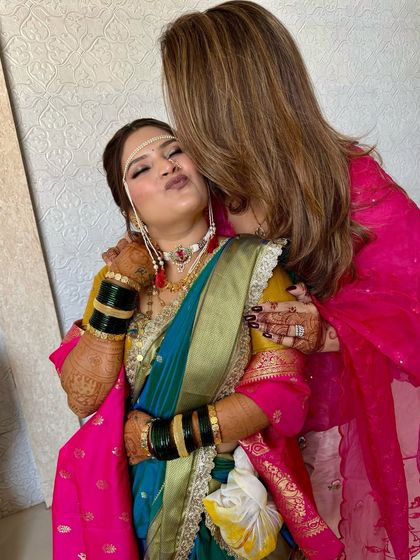 A sweet moment with my favorite 'Navri'. It’s moments like these that make my job so rewarding. Her makeup is soft and pretty, perfect for her big day.