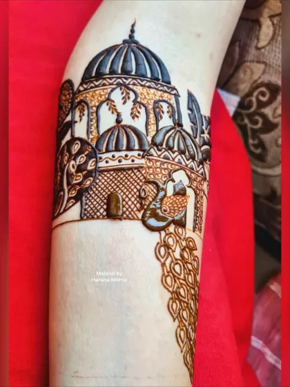 This design focuses on majestic architectural elements, with grand domes and archways. A graceful peacock with a flowing tail adds a touch of nature and royalty to the piece.